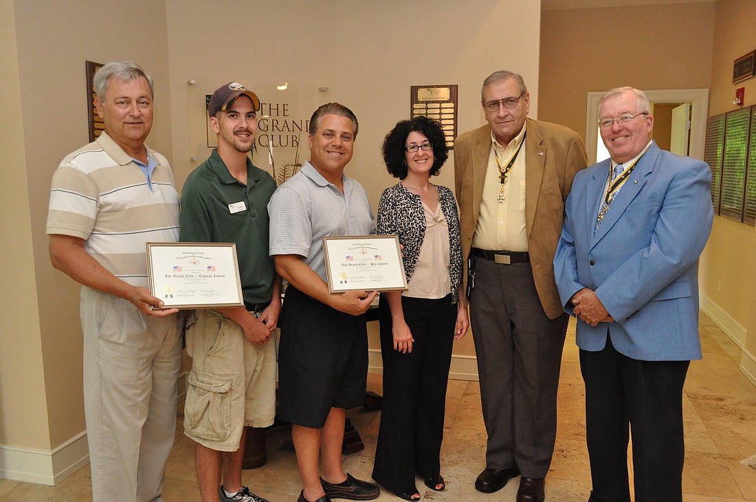 Grand Club Managing Member Henry Angle, cart staff member Joseph Kerber, Chief Operating Officer Brian Malanson, Managing Member Kim Pepe, SAR Vice President Ted St. Pierre and SAR Genealogist Registrar Bill Creager BRIAN MCMILLAN