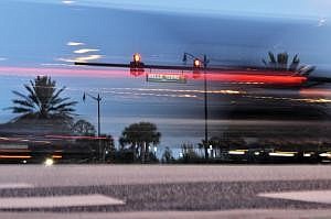 City officials want something down about the red light camera at the intersection of State Road 100 (westbound) and Memorial Medical Parkway. FILE PHOTO