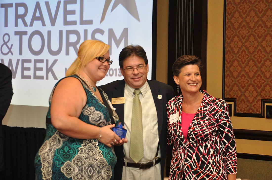 Kellie Scribner, award winner, Nate McLaughlin and Georgia Turner