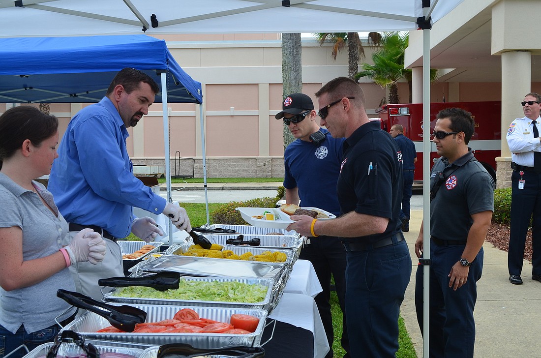 EMT Paramedics enjoy free lunch as part of Florida Hospital Flagler's celebration of Nation Emergency Medical Services Week. (Photo credit: Jared Mauldin)