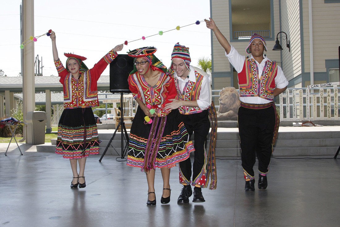The Hispanic American Group of Deltona (HADGD) performs a Peruvian dance at the festival. COURTESY PHOTOS BY JOHN MANZE