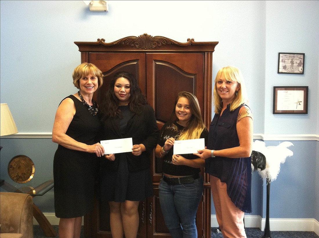 The Palm Coast Arts Foundation awarded scholarships to Jessica Insua and Nina Eustaquio.
