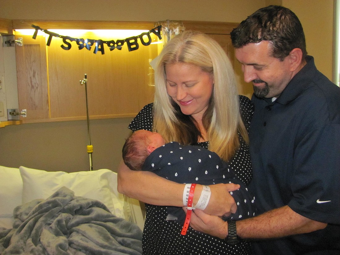 Marcy and Stephen Eisele with Jackson Finn at Florida Hospital Memorial Medical Center. COURTESY PHOTOS