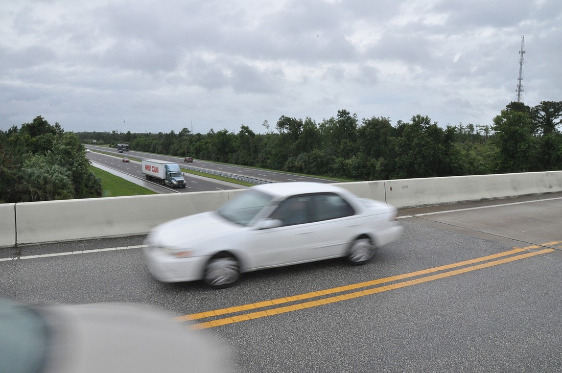 The city wants to spend $3.5 million in impact fees for road extension projects before the Matanzas Woods Interstate 95 interchange is built. SHANNA FORTIER