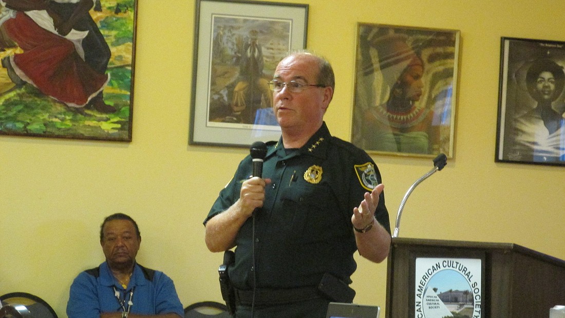 Sheriff Jim Manfre, who has been presenting his vision to many groups in Flagler County, speaks at a meeting of the African American Cultural Society about his hopes for future correctional resources. Photo by Megan Hoye.