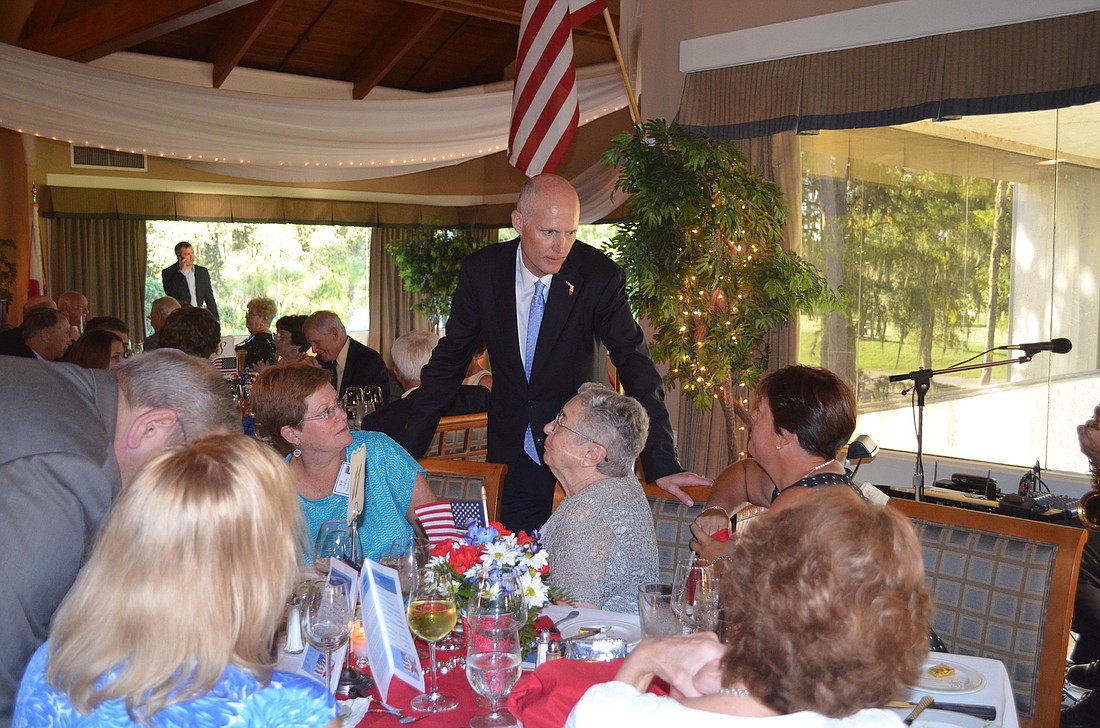 Gov. Rick Scott (R), greeted attendees at the dinner before giving his keynote speech.