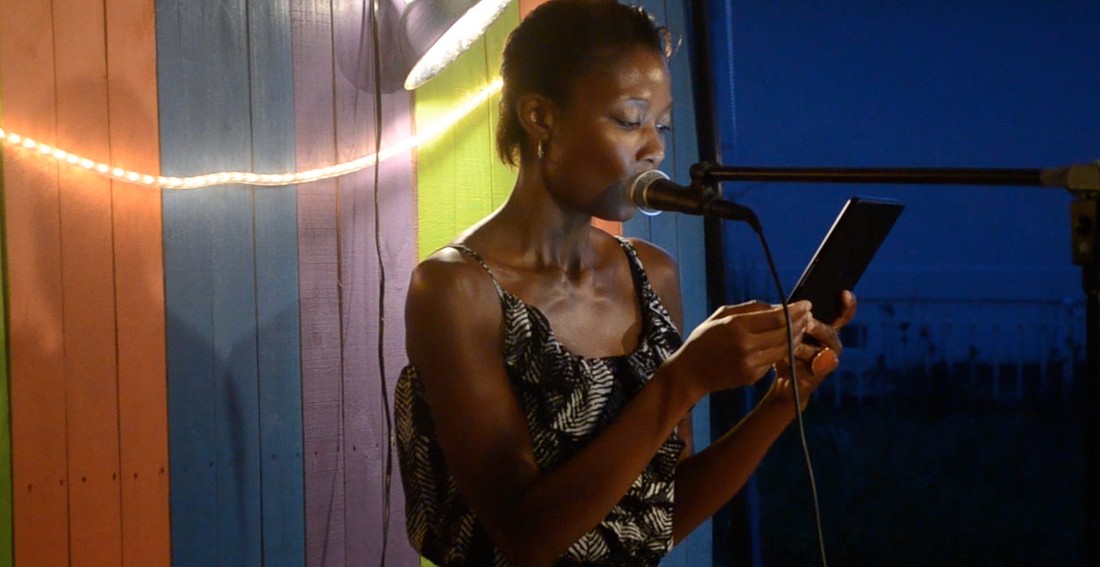 Tameka McDowell shares writings at The Inspired Mic event on Tuesday night at Beach House Beanery