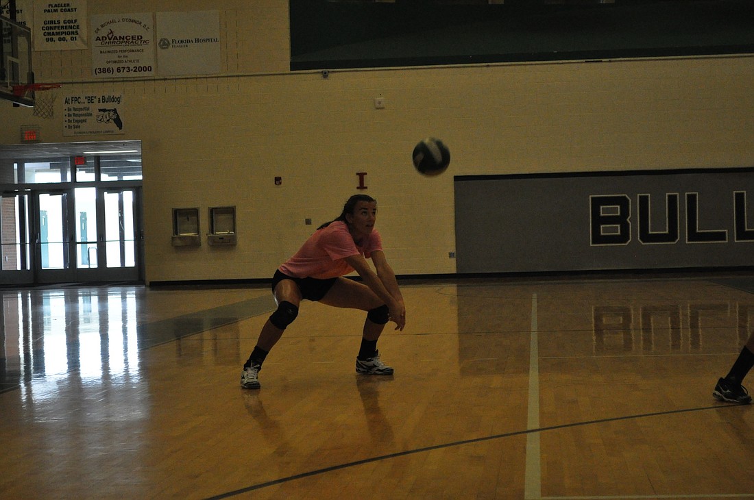 FPC's Olga Nushtayeva goes for a bump Wednesday during practice. PHOTOS BY ANDREW O'BRIEN