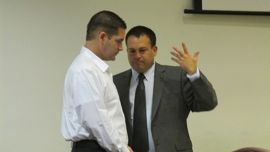 Lonnie Redner and his attorney, Bradley Sherman during Redner's trial. File photo.