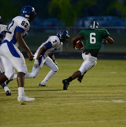 Loubens Polinice (No. 62) and Marcaus Cooper (No. 7) are two of six players who play both offense and defense for Matanzas. (File photo by Bob Rollins)