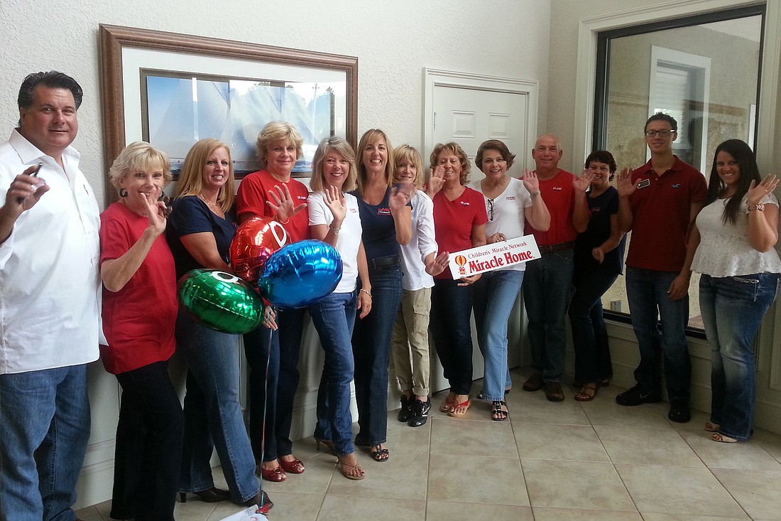 Staff at RE/MAX Oceanside wore jeans to raise money for the Children's Miracle Network on Miracle Jeans Day.