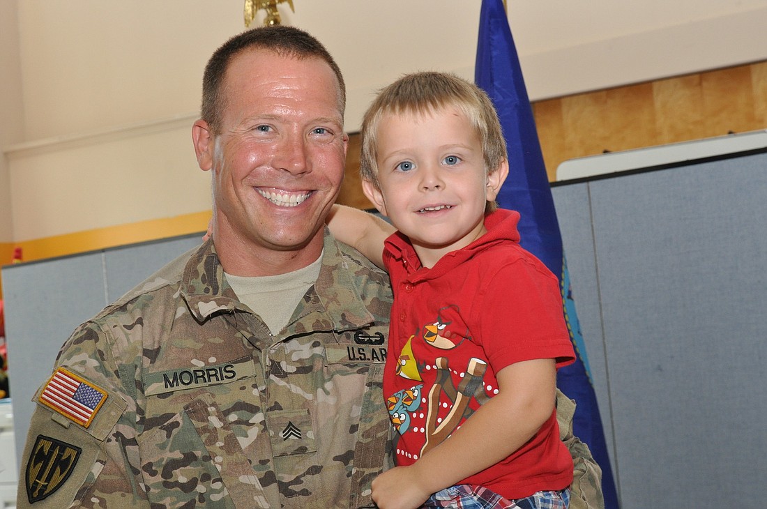 Sgt. Joe Morris and his son, Brennan PHOTOS BY SHANNA FORTIER