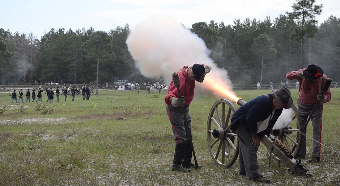 Though unloaded, the cannons used in the Civil War re-enactment still emit sparks and debris to accompany the thundering booms.