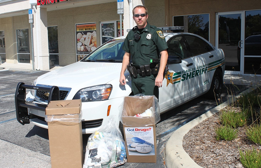Flagler County Sheriff's Office deputy Daniel Weaver collected several bags at the Palm Coast precinct. (Courtesy photo)