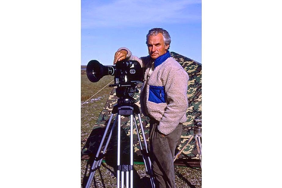 Wolfgang Obst with his filmmaking gear near the Arctic Ocean in Alaska. Photo courtesy of Wolfgang Obst.