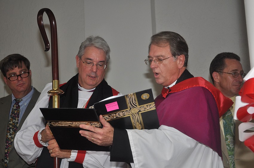 Bishop Dabney T. Smith and Rev. Frederick A. Robinson bless the new palm ave terrace