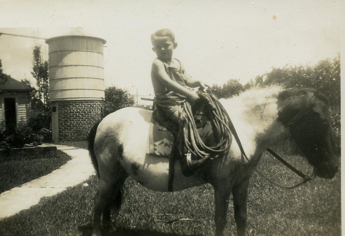 Sisco Deen wasn't always telling stories of Flagler County history. He was living it, riding through Bunnell on a horse in 1945. PHOTO COURTESY OF THE FLAGLER COUNTY HISTORICAL SOCIETY