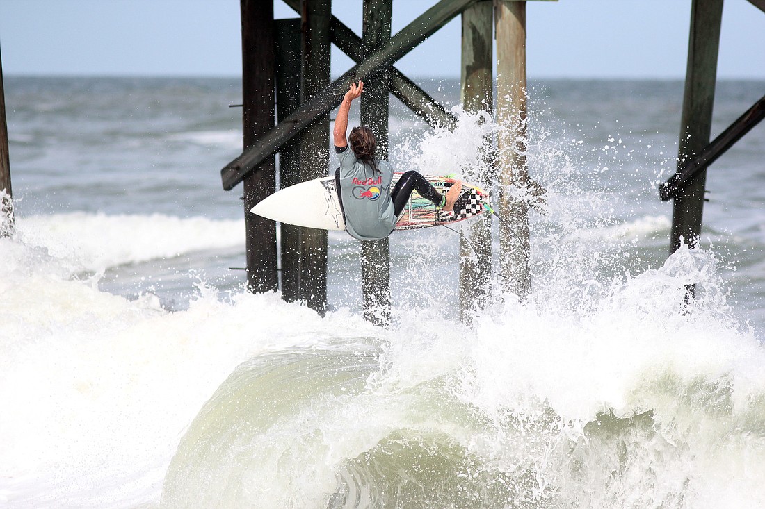 Jesse Heilman gets big air during the Red Bull Top Whip tow-at contest Saturday at the Tommy Tant Memorial Surf Classic. PHOTOS BY SHANNA FORTIER