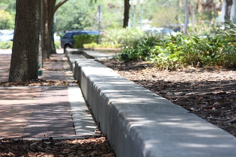 The concrete wall surrounding Selby Five Points Park will be removed.