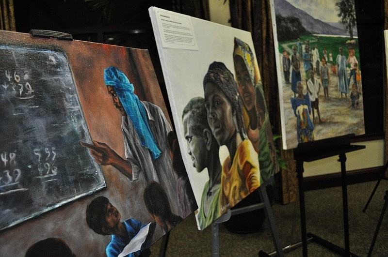 The art show featured paintings by internationally known artist Hilary Wallis.