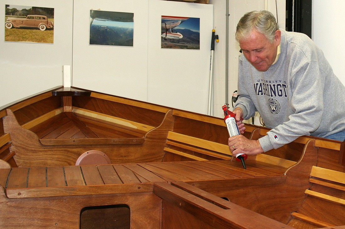 Palm Coast resident Jim Bennet builds wooden boats in his garage.