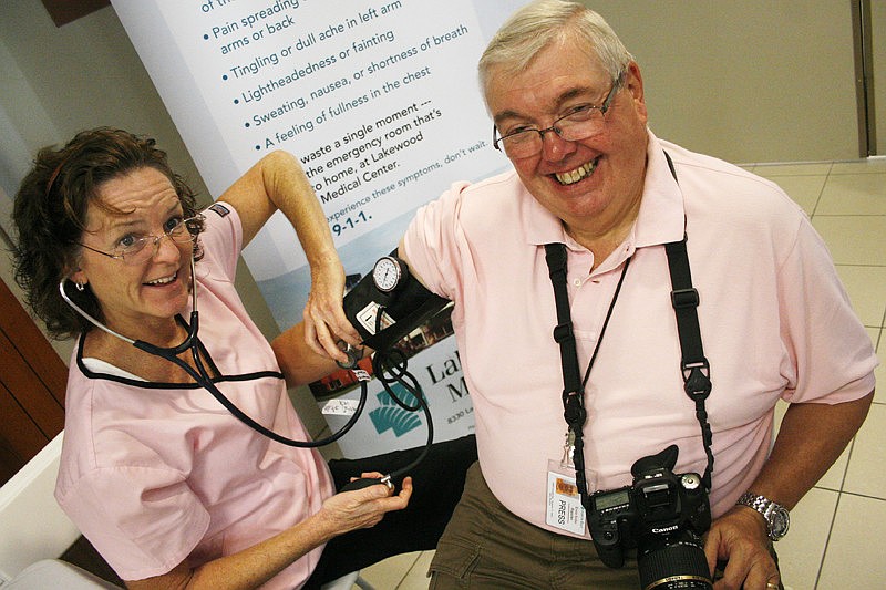 Lakewood Ranch ER nurse Kate Gessner checked Ernie Sollerâ€™s blood pressure at this year's expo.