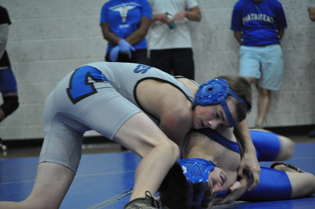 Matanzas' Chris Mixan wrestles against a Palatka athlete Saturday morning. Mixan, a first-year wrestler for the Pirates, won the match. (Photos by Andrew O'Brien)