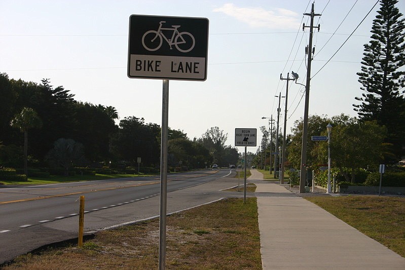 The Florida Department of Transportation promises to work to reduce signs along Gulf of Mexico Drive.