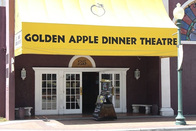 Patrons of the Golden Apple Dinner Theatre have traditionally parked in the lot behind the business.