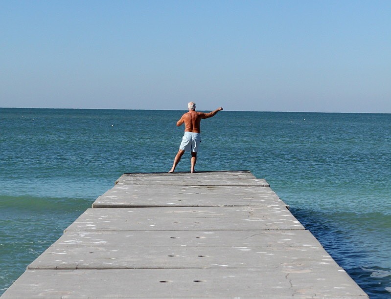 One man used the groin near The Colony Beach & Tennis Resort as a place to exercise.