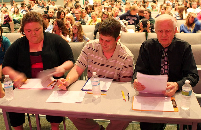 Judges Ms. Becky Austerman, Mr. Ben Hall and Dr. Tom Zellers.