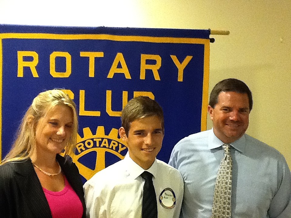 Flagler Palm Coast's Brandon Roa (middle) with his mom, Sandy, and FPC cross-country coach Dave Halliday (Courtesy photo)