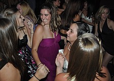 Seventeen-year-old Sarah McCoi, center, had a blast dancing with her friends.