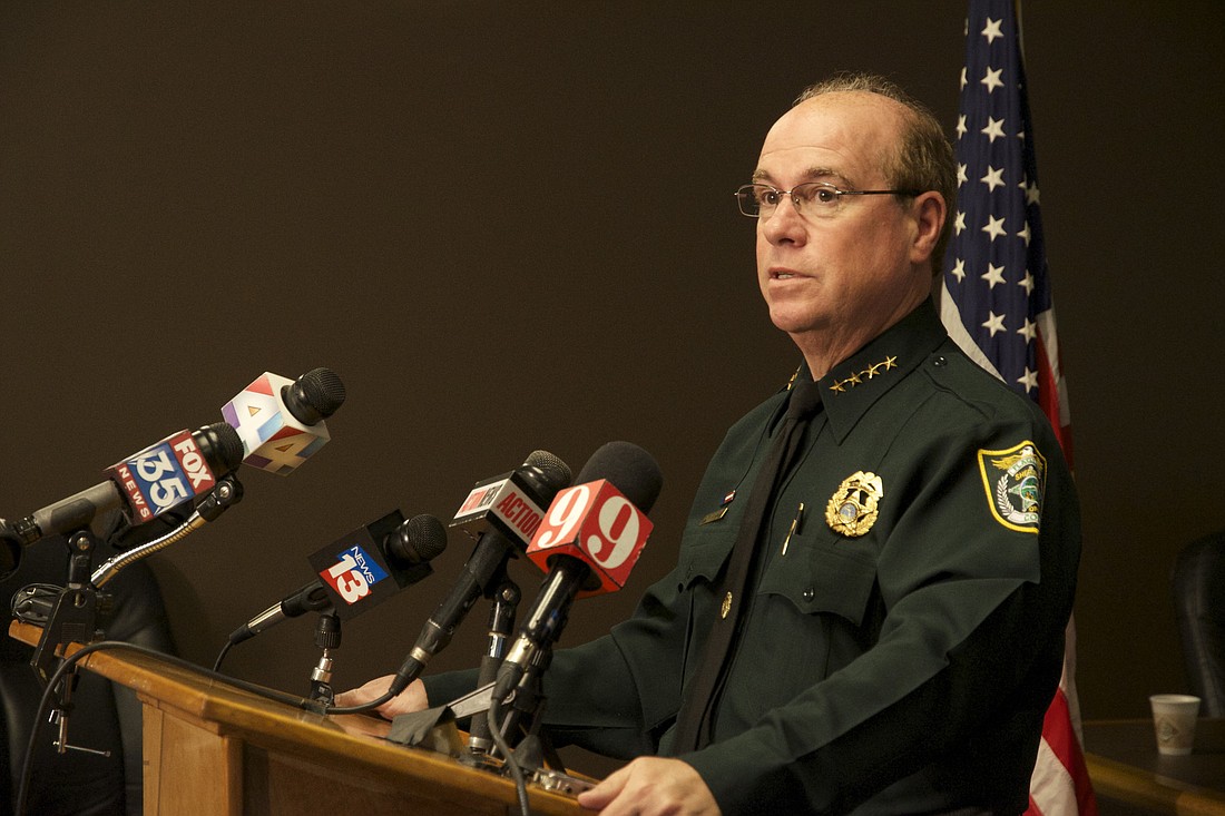 Flagler County Sheriff James Manfre speaks to reporters Sunday morning about damage from a tornado that touched down Saturday, Dec. 14. (Photo by Steven Sobel)