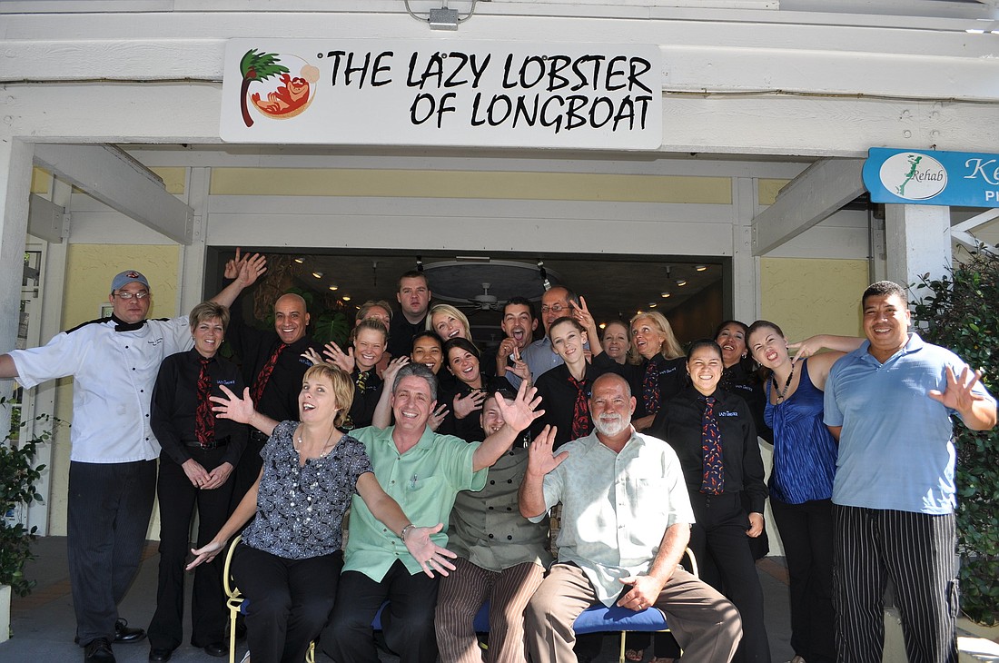 Lazy Lobster staff celebrates outside the restaurant.