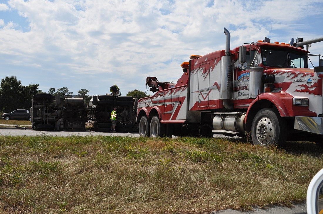 Tow trucks worked to remove the semi-truck until about 2 p.m.