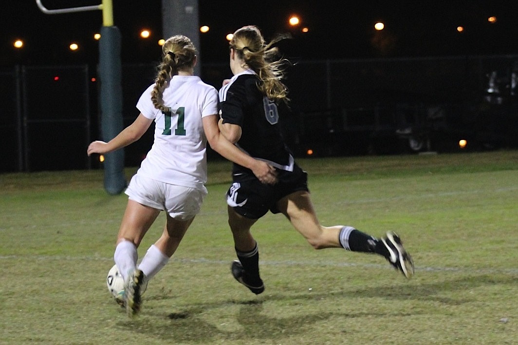 Flagler Palm Coast's Madison Hald (left) battles for the ball Thursday night against Stanton. (Photo courtesy of Zack Hattani)