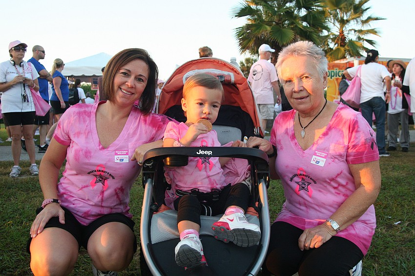 Cassandra Dusseaux, pictured with her daughter, Olivia, 2, and her mother, Modra Gaeta, walked with the Sarasota County Sheriff's Office.