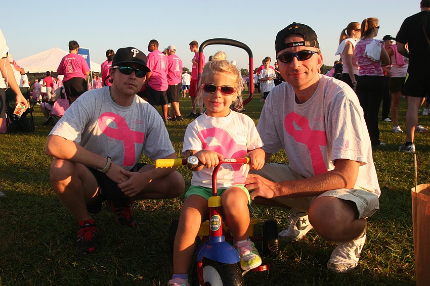 Gary Sweeney and Chris Anders, pictured with Cambell Anders, 3, walked in support of Anders' wife, Leslie.