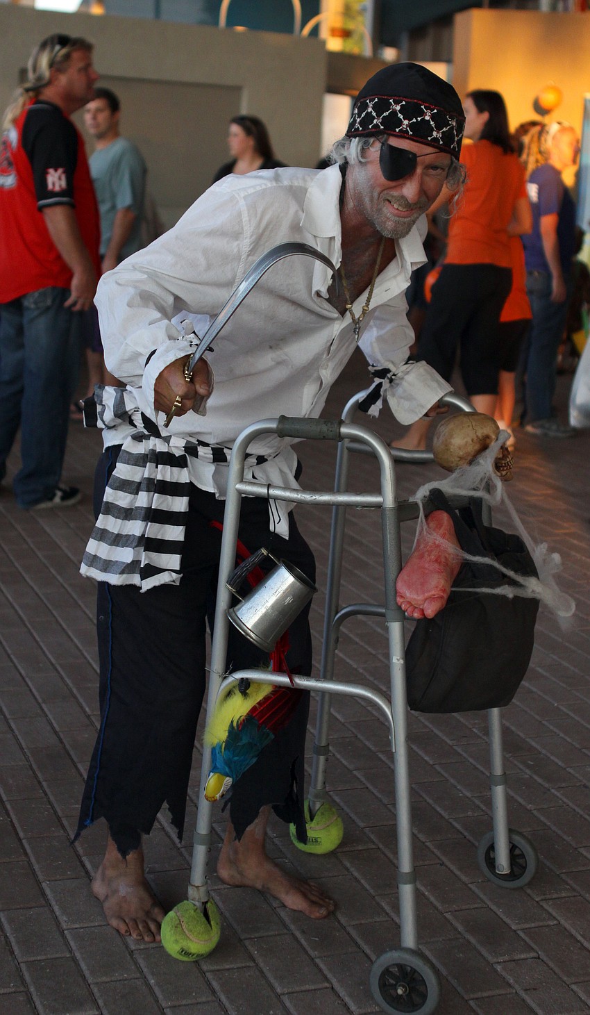 Mike Collins goes around Mote as a scary pirate.