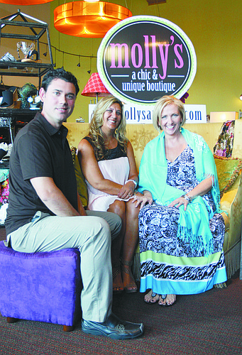 Contest winners Javier Sanchez and Georgia Gruber with molly's owner Molly Jackson