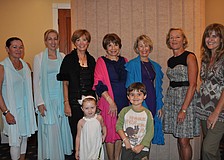 Models from left: Jan Holly, Rena Nietz, Karin Jones, Ronni Minnig, Angela Freeman, Marie Hunter, Alessandra Massaro. Front row: Rena Nietz, age 3, and Louie Massaro, age 4.