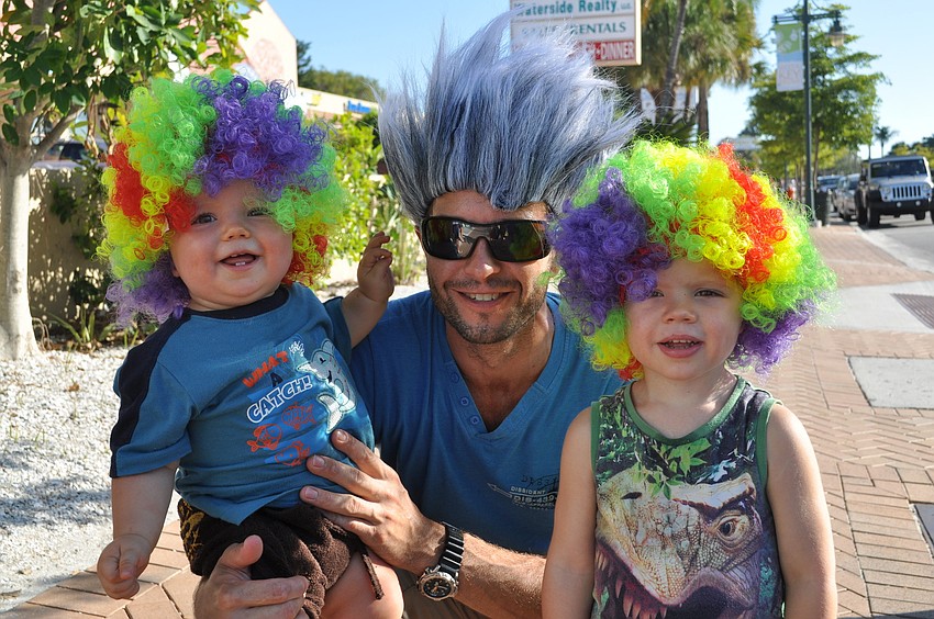 Truls Oppedal, with sons Oscar and Martin, don some colorful and crazy wigs.