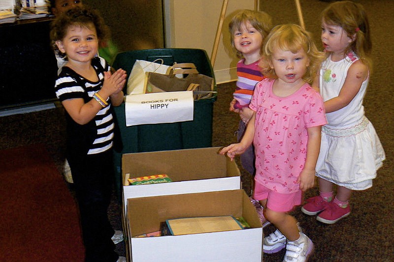 Children from the Gan helped pack up 115 books.