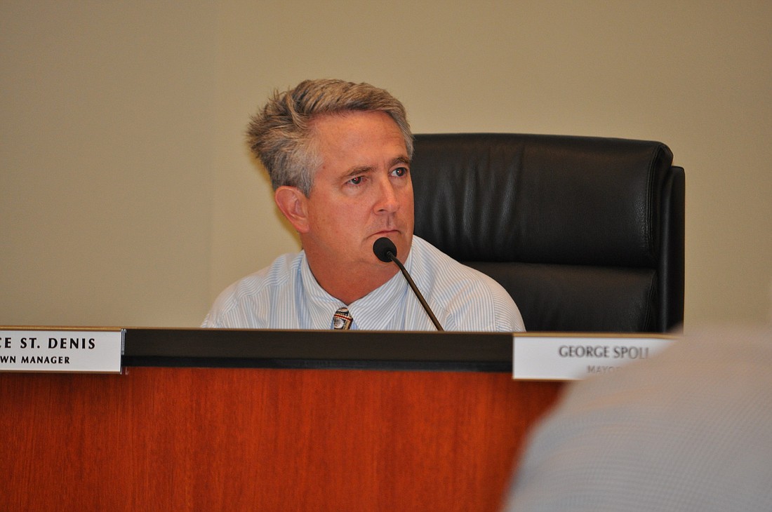 Bruce St. Denis told the Town Commission a north-end beach project is needed to save homes from sever erosion.