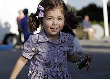 Three-year-old Hannah Leitzman dressed up as a cowgirl for Halloween.