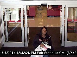 Police are asking for help identifying this woman, who was recorded stealing from a parked car outside Anytime Fitness. (Courtesy photo)