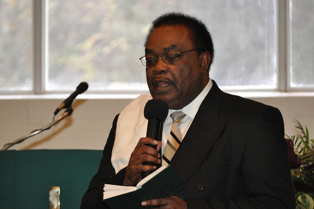 The Rev. Gillard S. Glover speaks to congregants at First Church in Palm Coast, Jan. 19. (Photo by Jonathan Simmons)