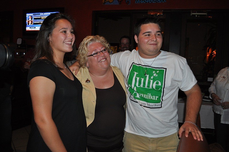 Julie Aranibar celebrated her election to the Manatee County School Board with her children, Jackie and John.