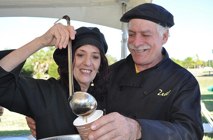 Nina and John Arico, owners of Zest! of Sarasota, serve up some tortilla soup.